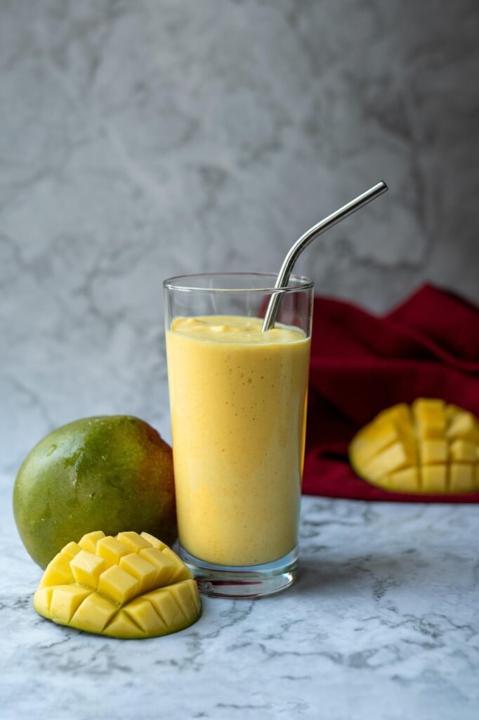 mango, cocktail, shake, drink, yellow, healthy, glass, straw, metal straw, mango shake, cold drink, refreshment, beverage, nature, summer